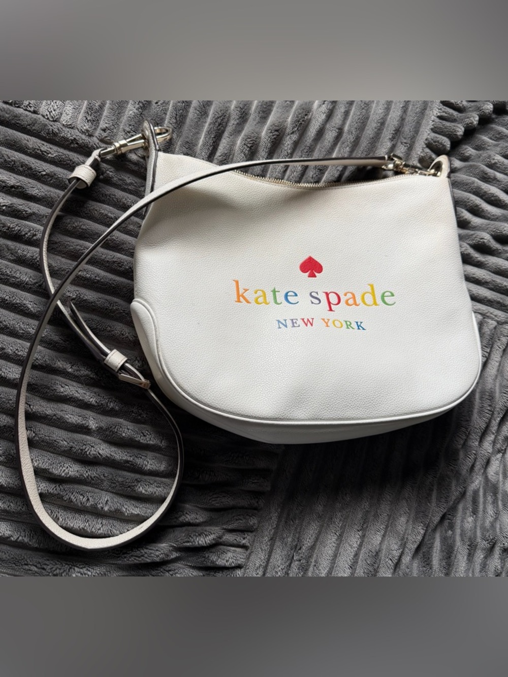 kate spade White Pebble Leather Crossbody with Rainbow Logo